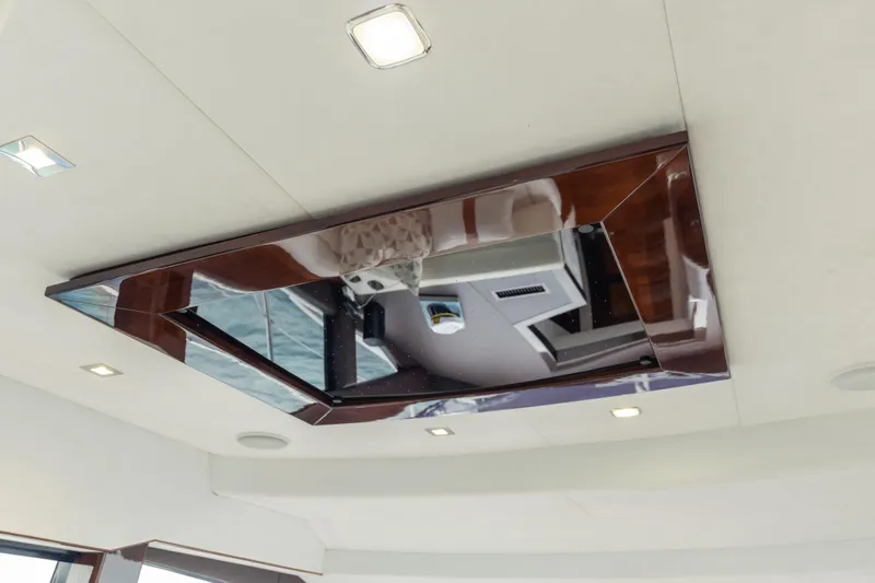 Infinity Yacht Photos Pics Ceiling view of 2020 Galeon 500 Fly yacht interior with modern lighting.