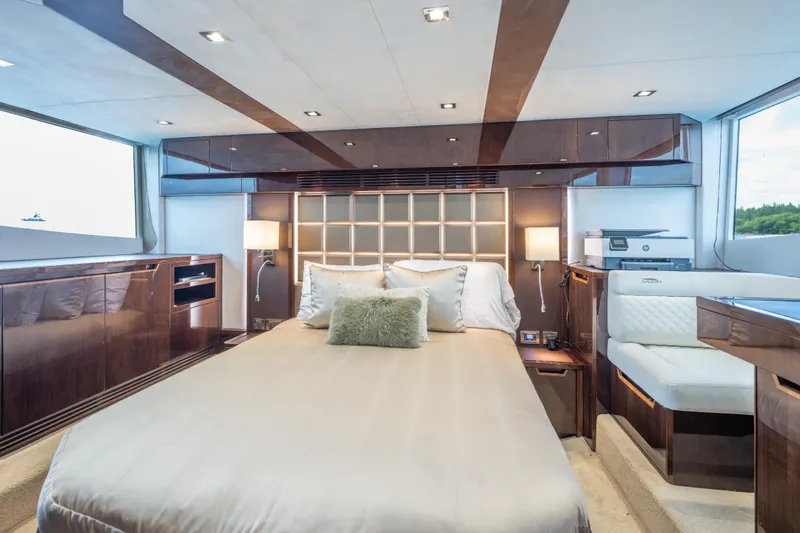 Infinity Yacht Photos Pics Luxurious bedroom interior of 2020 Galeon 500 Fly yacht with modern design and elegant furnishings.