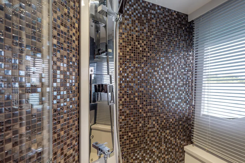 Infinity Yacht Photos Pics Luxurious bathroom with mosaic tiles in 2020 Galeon 500 Fly yacht.