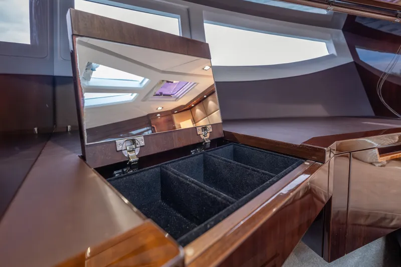 Infinity Yacht Photos Pics Luxurious interior of 2020 Galeon 500 Fly yacht with open storage compartment.