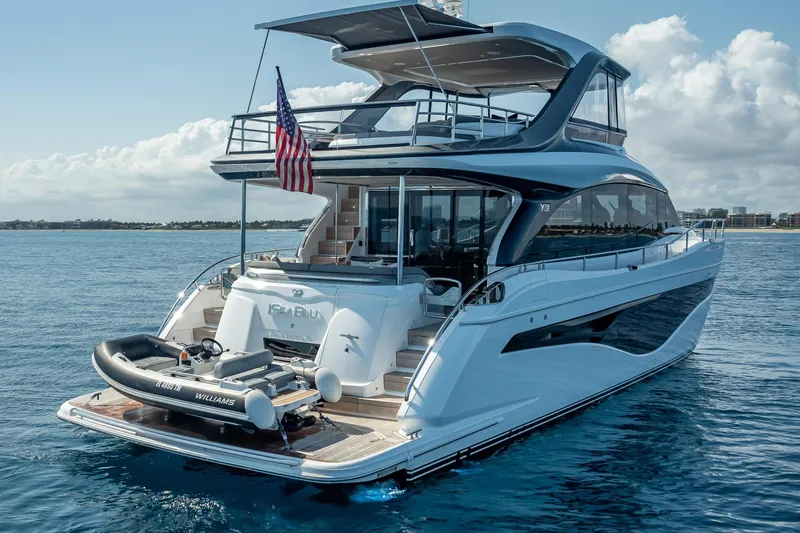 Iseablu Yacht Photos Pics Luxurious 2023 Princess Y72 yacht on open water, featuring sleek design and American flag.