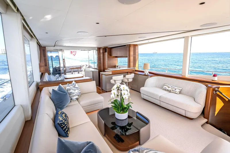 Iseablu Yacht Photos Pics Luxurious interior of 2023 Princess Y72 yacht with ocean view and elegant furnishings.