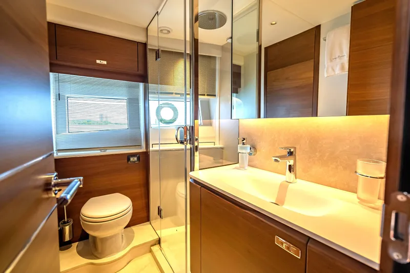 Iseablu Yacht Photos Pics Luxurious bathroom in 2023 Princess Y72 yacht with modern fixtures and elegant design.