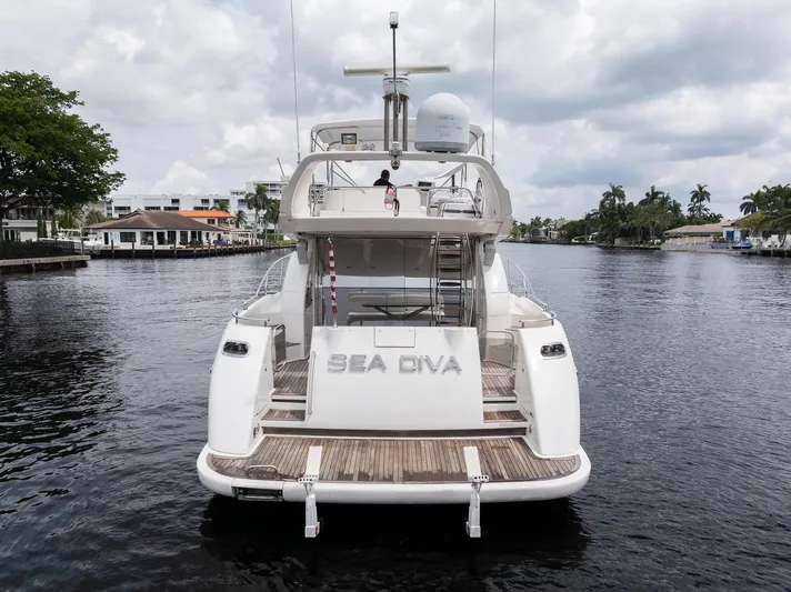 Sea Diva Yacht Photos Pics Azimut 58 yacht "Sea Diva" on a calm waterway, 1999 model.