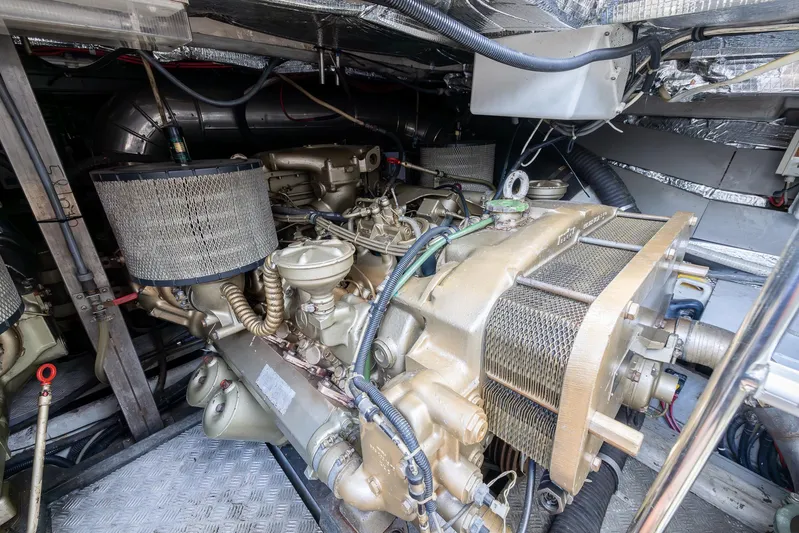 Sea Diva Yacht Photos Pics Engine room of a 1999 Azimut 58 yacht, showcasing detailed machinery and components.