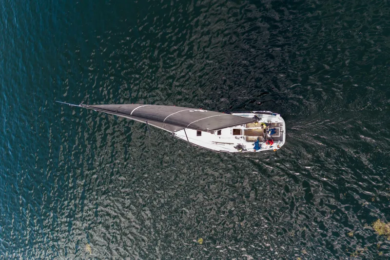 "mah Na Mah Na" Yacht Photos Pics Aerial view of 2020 J Boats J/112E sailing on open water.