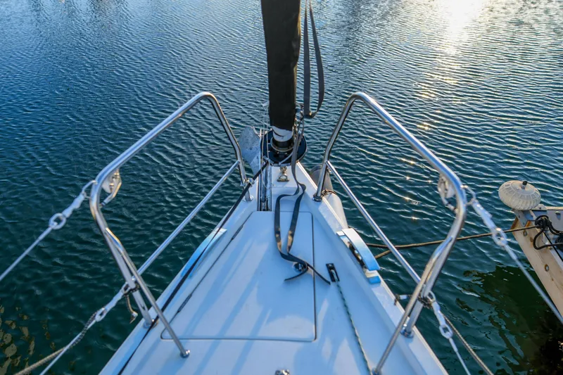 "mah Na Mah Na" Yacht Photos Pics Bow view of 2020 J Boats J/112E sailboat on calm water.