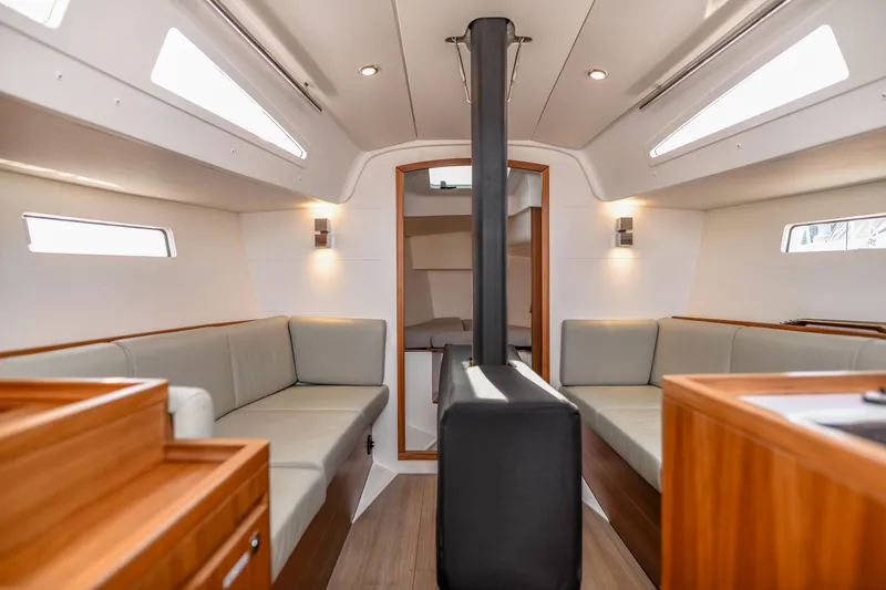 "mah Na Mah Na" Yacht Photos Pics Interior of 2020 J Boats J/112E sailboat, featuring modern seating and sleek design.