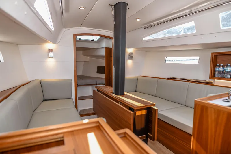 "mah Na Mah Na" Yacht Photos Pics 2020 J Boats J/112E interior with modern seating, wood finishes, and ample natural light.