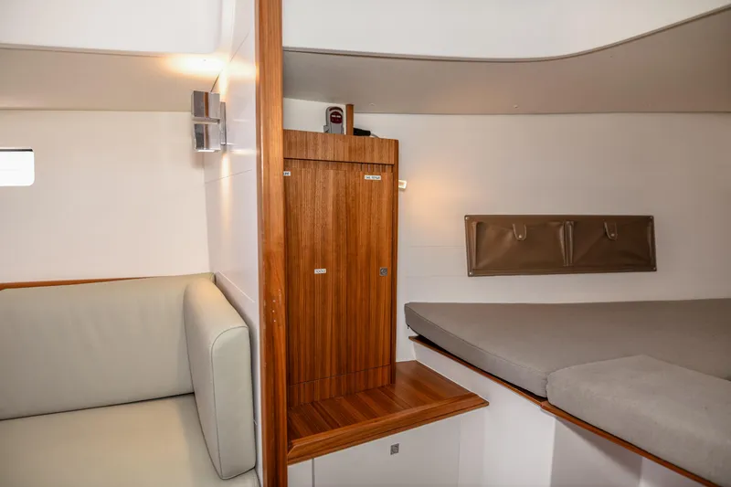 "mah Na Mah Na" Yacht Photos Pics 2020 J Boats J/112E interior cabin with wooden accents and cozy seating.