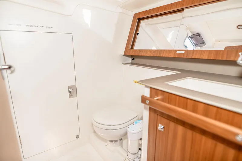 "mah Na Mah Na" Yacht Photos Pics 2020 J Boats J/112E yacht bathroom with wooden cabinetry and modern fixtures.