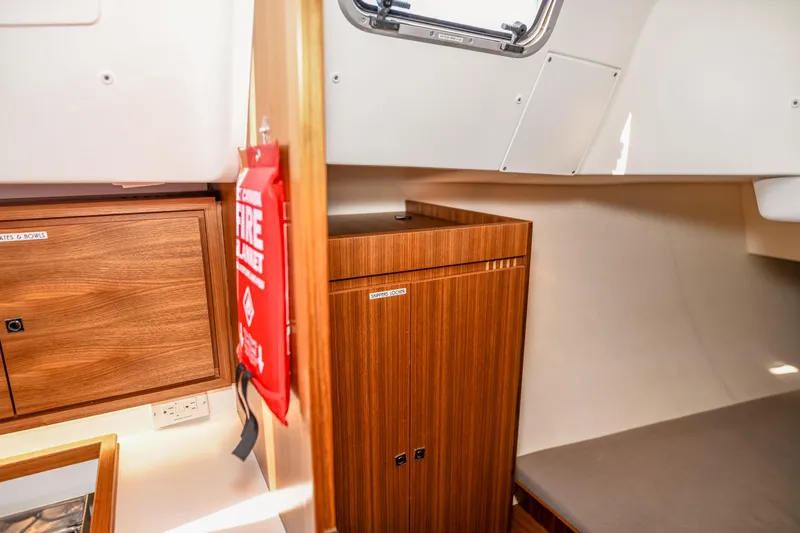 "mah Na Mah Na" Yacht Photos Pics Interior of 2020 J Boats J/112E yacht with wooden cabinetry and fire blanket.
