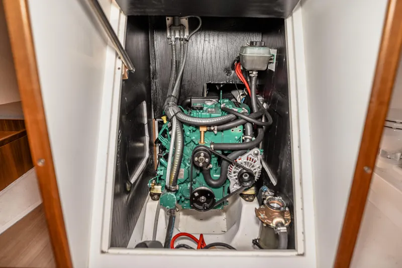 "mah Na Mah Na" Yacht Photos Pics Engine compartment of a 2020 J Boats J/112E sailboat, showcasing mechanical components.