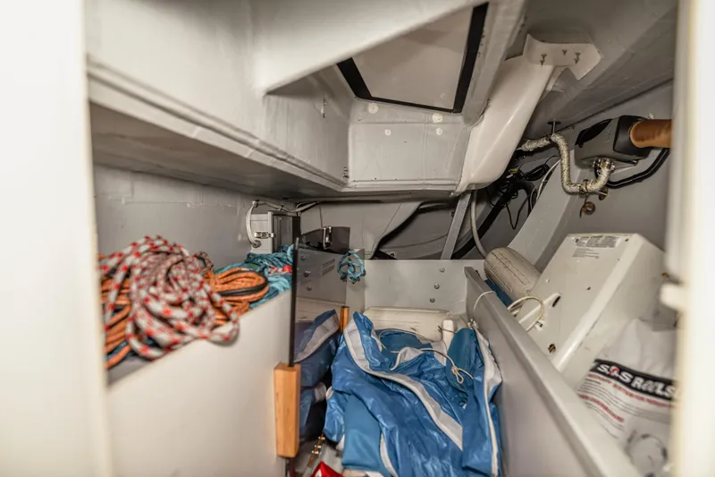 "mah Na Mah Na" Yacht Photos Pics Interior storage area of 2020 J Boats J/112E sailboat with ropes and equipment.