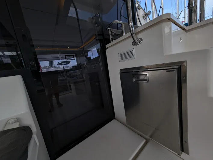 Salty Kiss Yacht Photos Pics Interior view of a 2020 Leopard 45 yacht, featuring a sleek stainless steel appliance.
