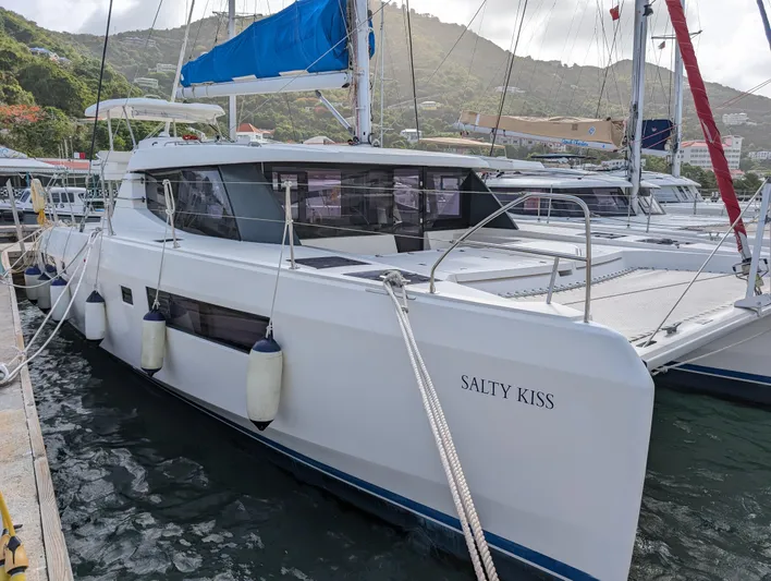 Salty Kiss Yacht Photos Pics Leopard 45 catamaran named "Salty Kiss" docked at marina, 2020 model.