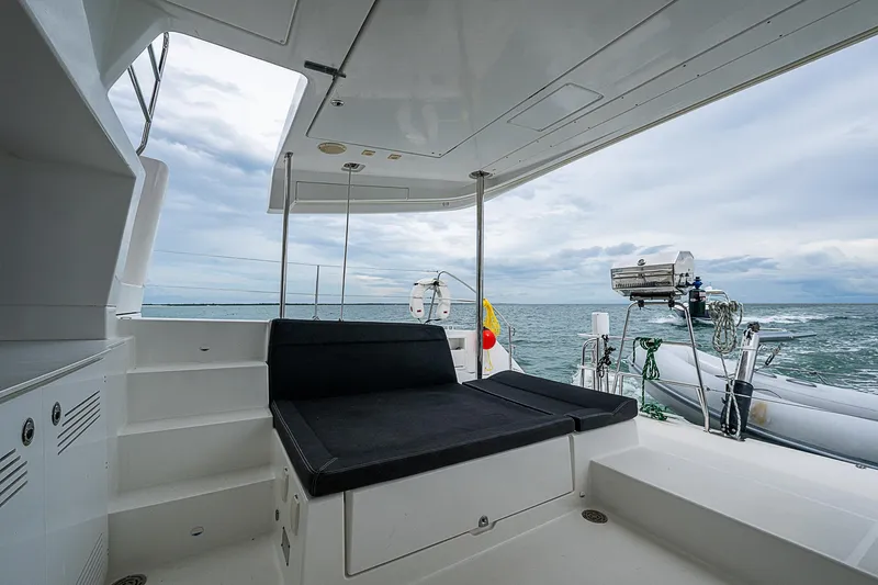 Somewhere Yacht Photos Pics Lagoon 450 catamaran deck with seating, ocean view, 2018 model.