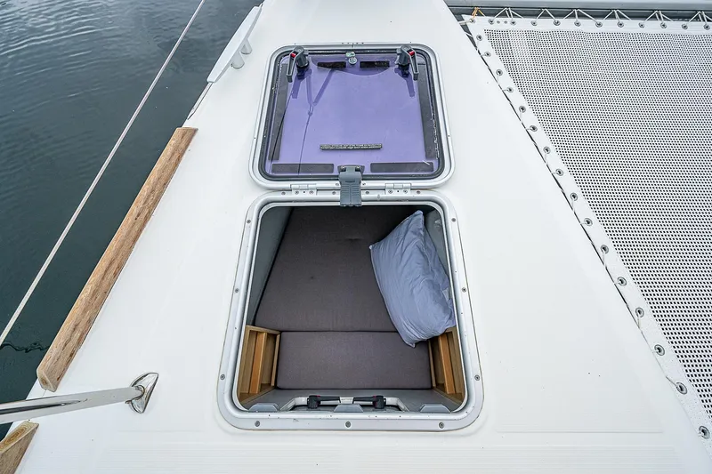 Somewhere Yacht Photos Pics Open hatch on 2018 Lagoon 450 catamaran deck with visible interior.