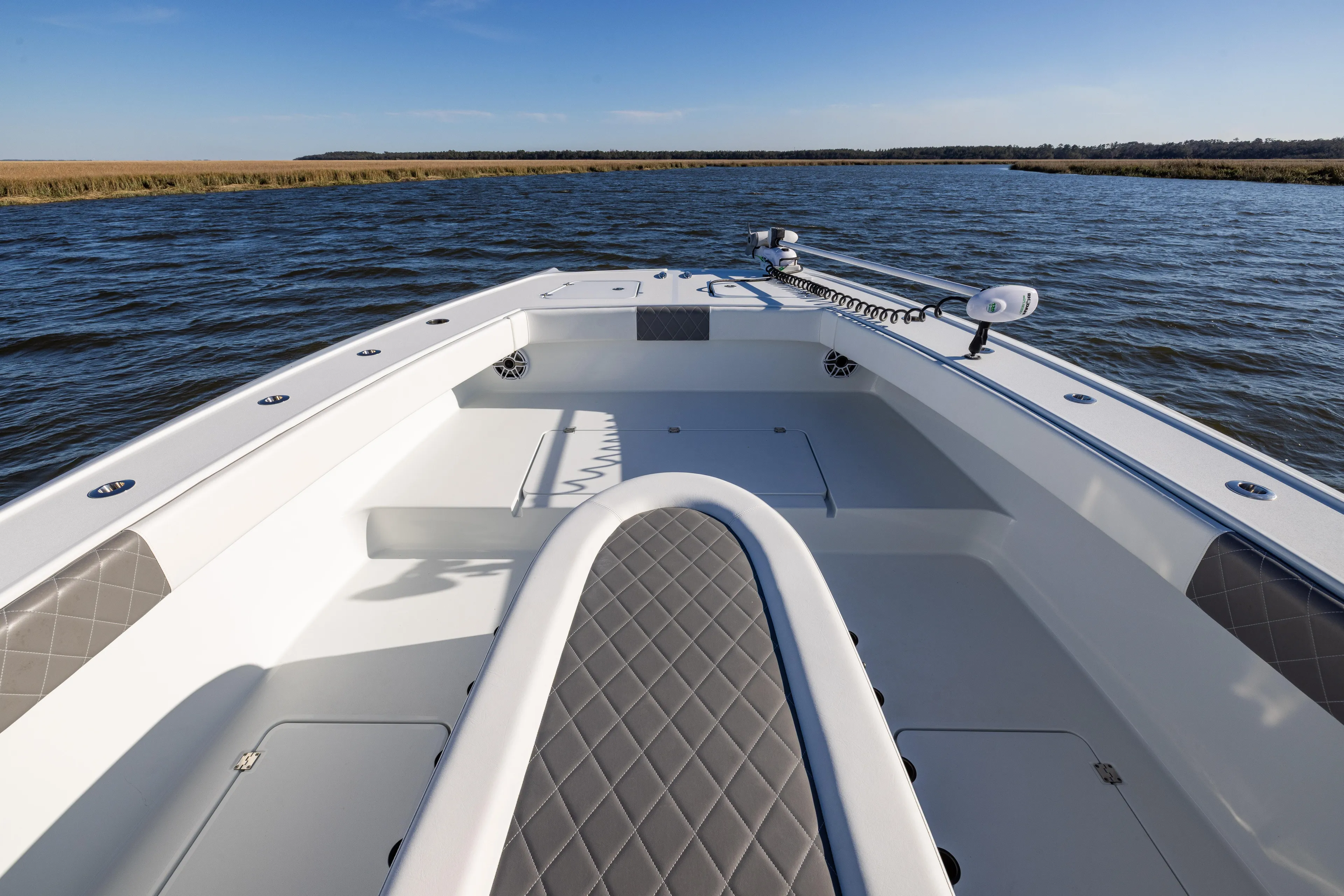  Yacht Photos Pics 2023 Freeman 34VH boat on calm water, featuring spacious deck and modern design.