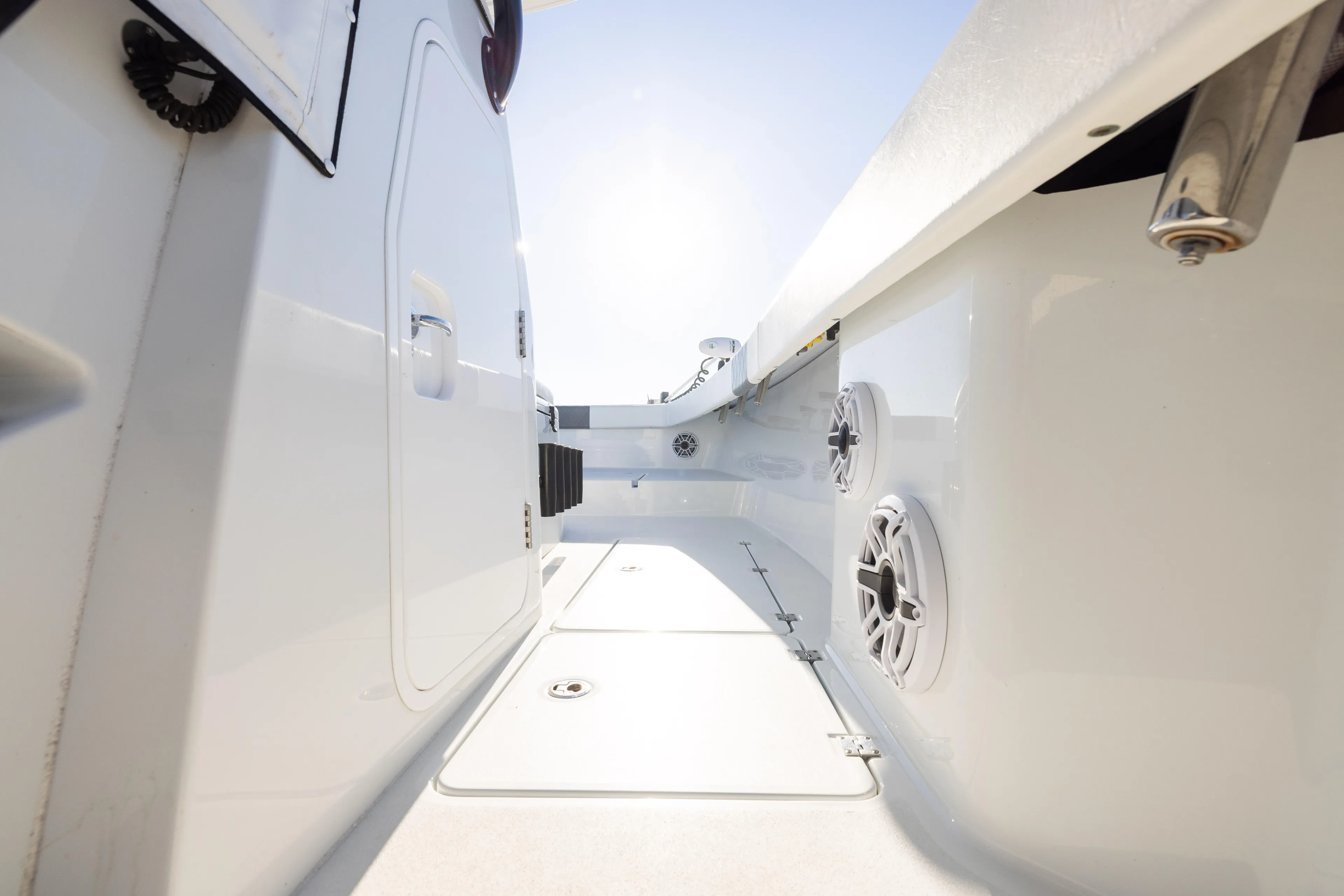  Yacht Photos Pics 2023 Freeman 34VH boat interior with speakers and storage compartments.