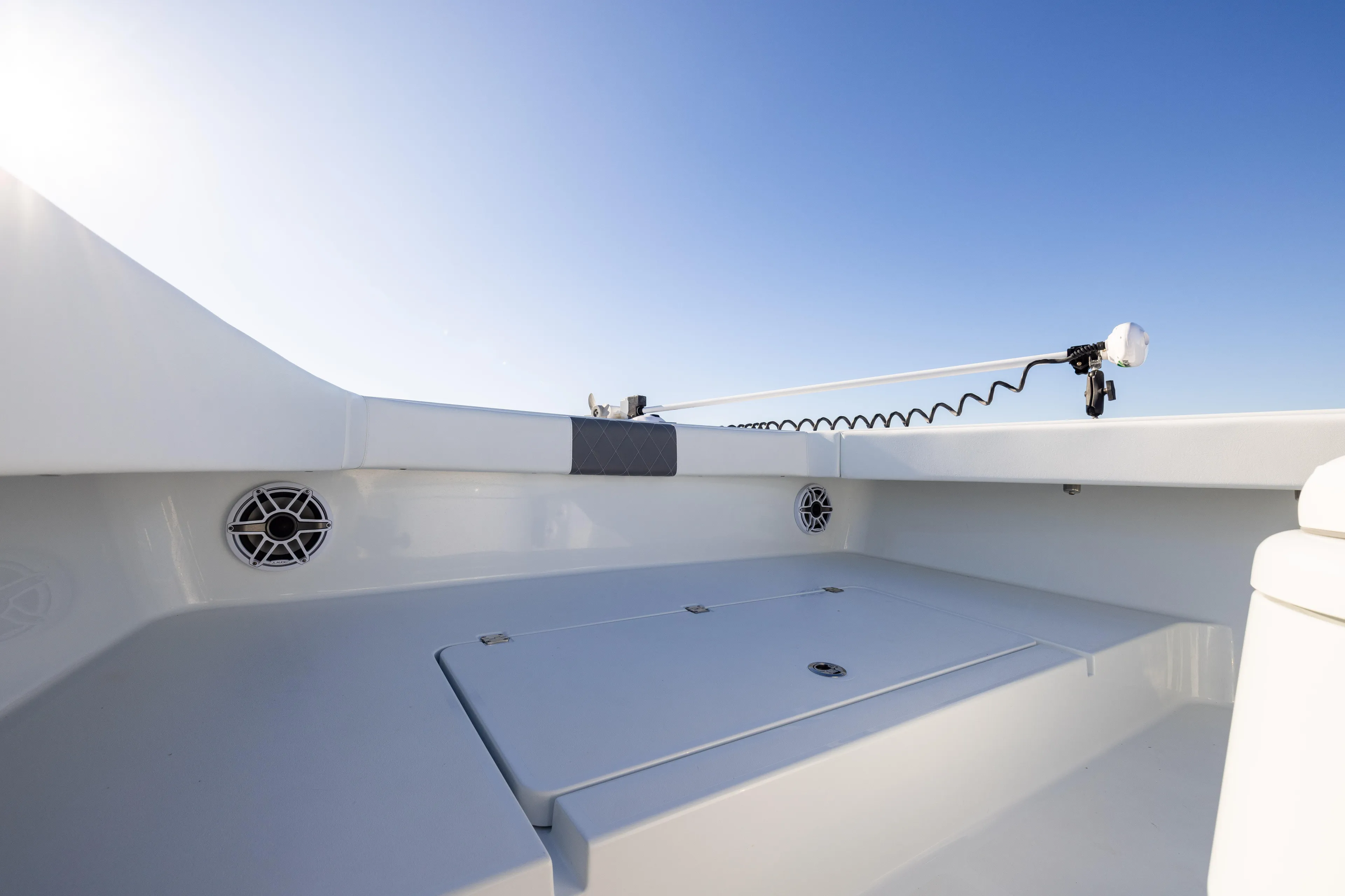  Yacht Photos Pics 2023 Freeman 34VH boat deck with speakers and clear blue sky.