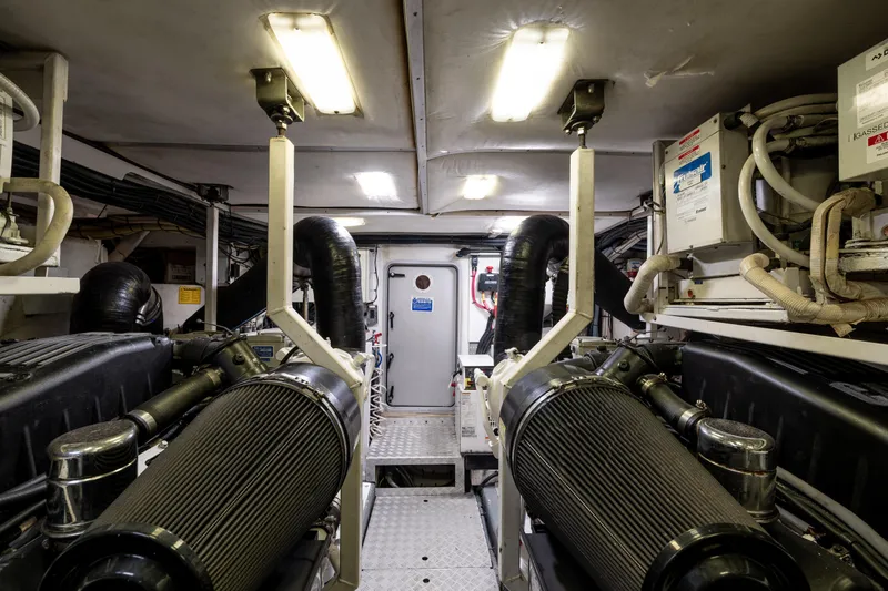 Ocaralia Yacht Photos Pics Engine room of 2008 Viking Princess 75 yacht, featuring machinery and equipment.