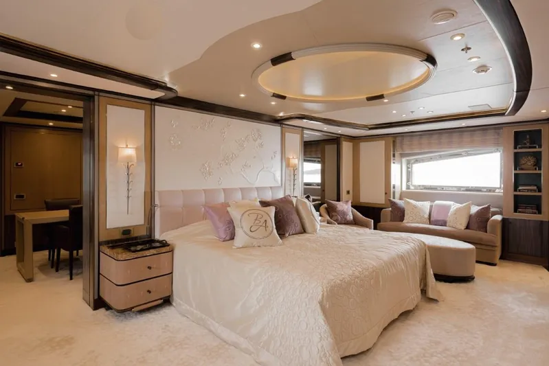 Belle Anna Yacht Photos Pics Luxurious yacht bedroom with elegant decor, featuring a large bed and plush seating. ISA 500, 2012.