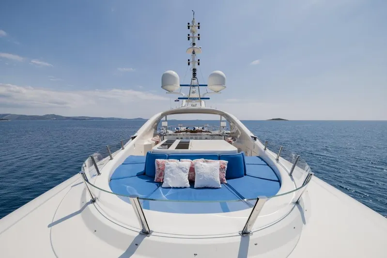 Belle Anna Yacht Photos Pics Luxurious ISA 500 yacht deck with blue seating, ocean view, 2012 model.