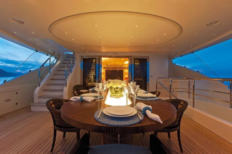 Belle Anna Yacht Photos Pics Luxurious yacht dining area with elegant table setting, ISA 500 model, 2012.