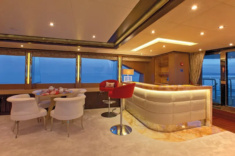 Belle Anna Yacht Photos Pics Luxurious interior of 2012 ISA 500 yacht with elegant seating and ambient lighting.
