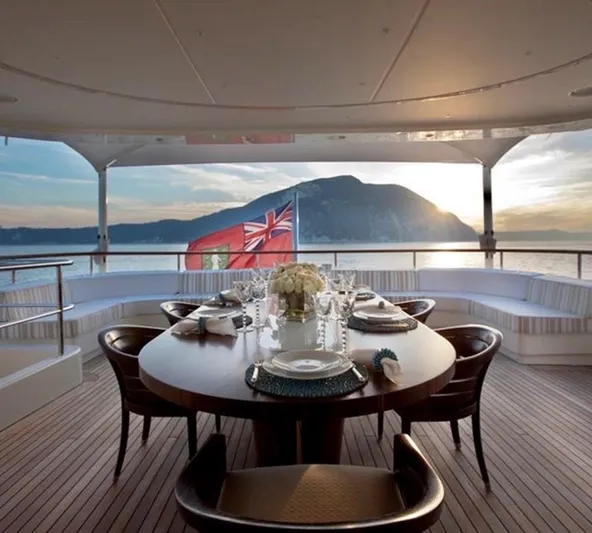 Belle Anna Yacht Photos Pics Luxurious yacht dining area with ocean view, featuring elegant table setting, ISA 500, 2012.