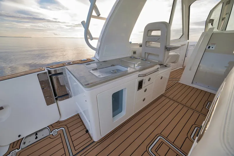  Yacht Photos Pics 2020 Boston Whaler 380 Realm interior with sleek design and ocean view.