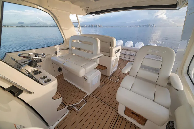  Yacht Photos Pics 2020 Boston Whaler 380 Realm interior with luxurious seating and ocean view.