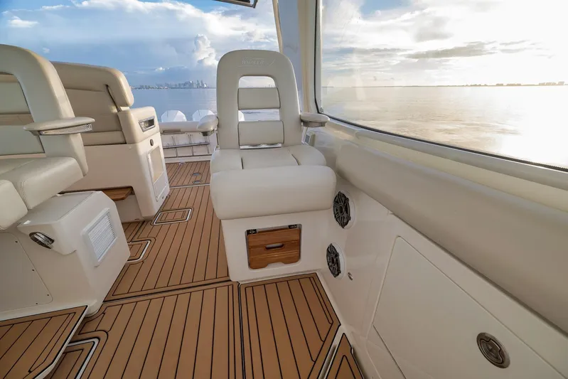  Yacht Photos Pics 2020 Boston Whaler 380 Realm interior with luxurious seating and ocean view.