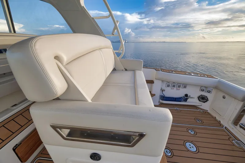  Yacht Photos Pics Luxury seating on 2020 Boston Whaler 380 Realm boat, overlooking serene ocean view.