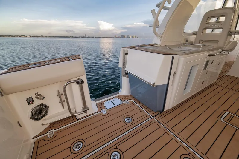  Yacht Photos Pics 2020 Boston Whaler 380 Realm boat deck with seating and ocean view.