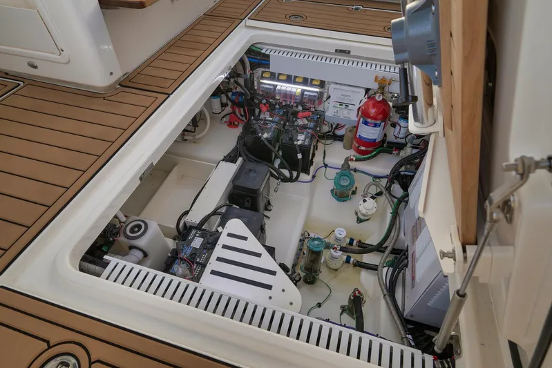  Yacht Photos Pics Engine compartment of 2020 Boston Whaler 380 Realm, showcasing wiring and equipment.