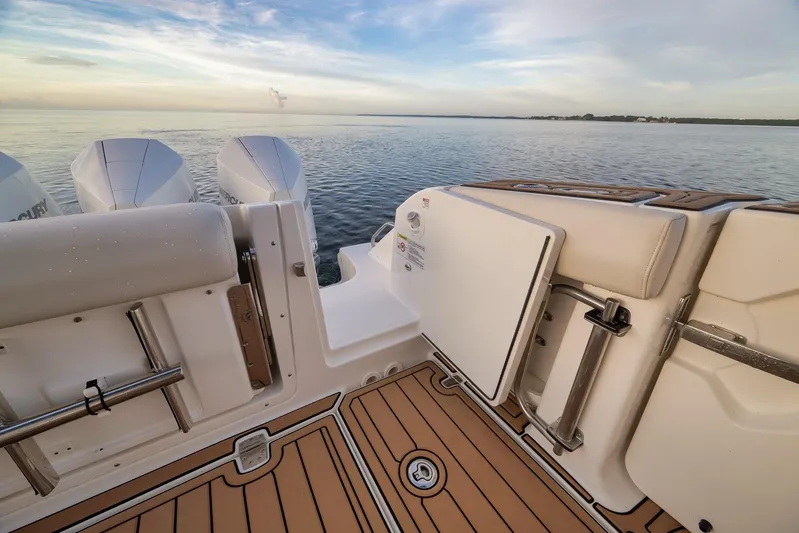  Yacht Photos Pics 2020 Boston Whaler 380 Realm boat deck with open hatch and ocean view.