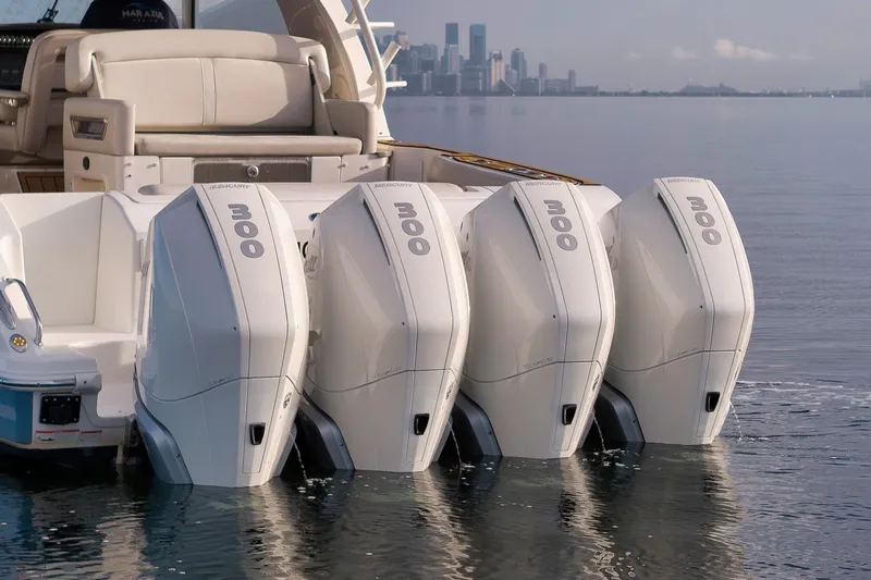  Yacht Photos Pics 2020 Boston Whaler 380 Realm with four Mercury 300 outboard engines on calm water.