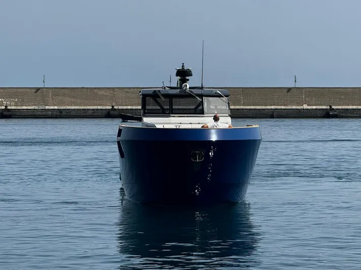 Yacht Photos Pics 2025 Aicon Audace 50 yacht in harbor, front view, calm water.