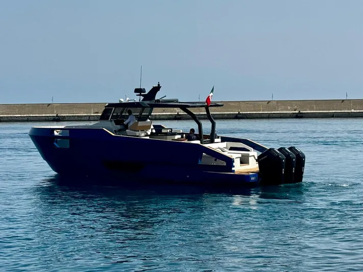  Yacht Photos Pics 2025 Aicon Audace 50 yacht on calm water, featuring sleek design and powerful engines.