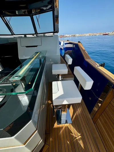  Yacht Photos Pics 2025 Aicon Audace 50 yacht with sleek deck and modern seating.