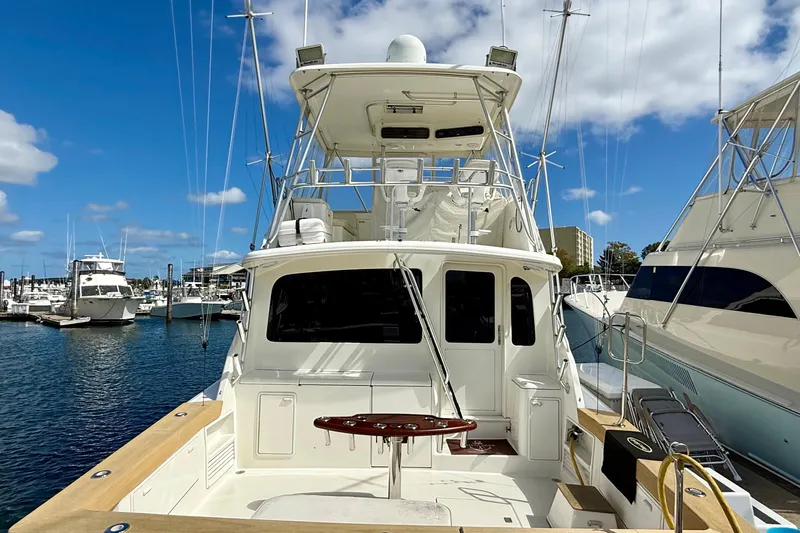  Yacht Photos Pics Ocean Yachts 48, 2000 model, docked at marina under blue sky.