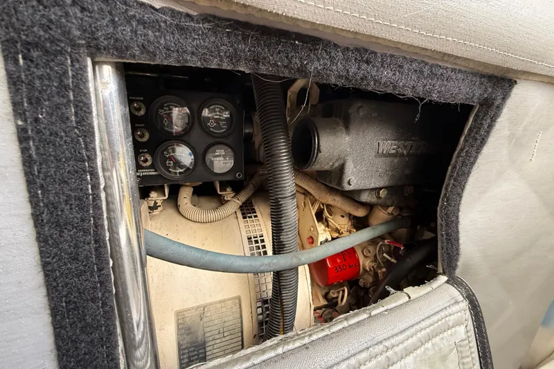  Yacht Photos Pics Engine compartment of a 2000 Ocean Yachts 48, showcasing gauges and components.