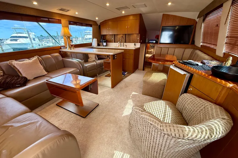  Yacht Photos Pics Luxurious interior of a 2000 Ocean Yachts 48, featuring elegant seating and modern amenities.
