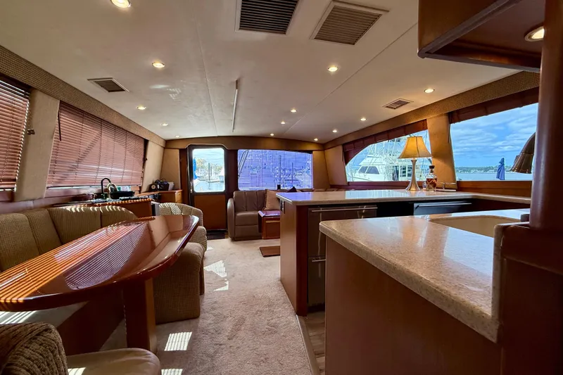  Yacht Photos Pics Luxurious interior of 2000 Ocean Yachts 48, featuring elegant seating and modern amenities.