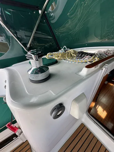 Knot Inspired Yacht Photos Pics Beneteau 411 sailboat deck, featuring winch and ropes, 2002 model.