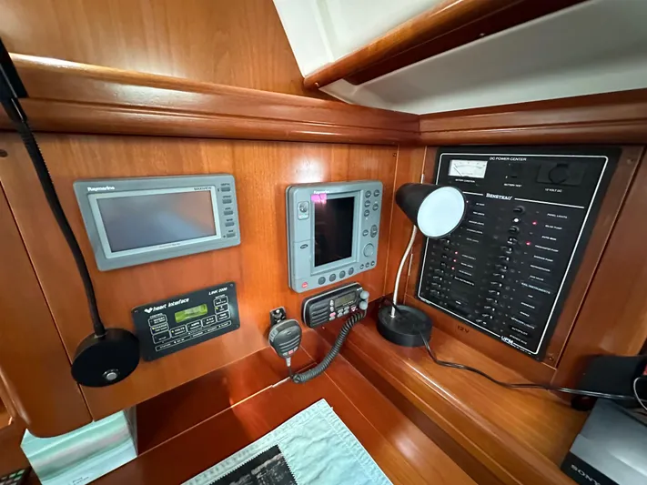 Knot Inspired Yacht Photos Pics Control panel of a 2002 Beneteau 411 yacht with navigation and communication equipment.