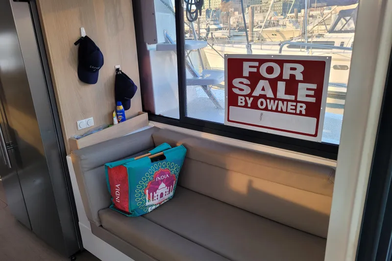  Yacht Photos Pics 2019 Bali 4.3 yacht interior with "For Sale by Owner" sign on window.