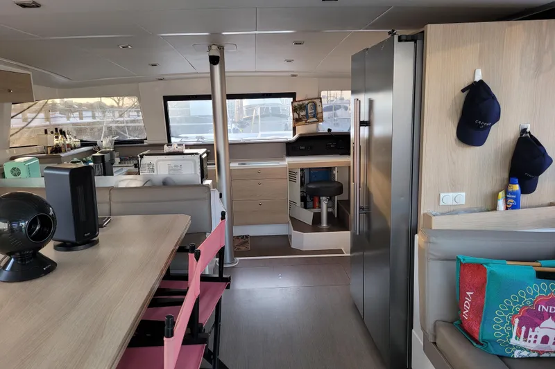  Yacht Photos Pics Interior of 2019 Bali 4.3 yacht with modern kitchen and seating area.